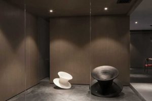 中央空調(diào)裝修棕色調(diào)旋轉(zhuǎn)藝術(shù)沙發(fā)員工休息區(qū)裝修圖工作室設(shè)計