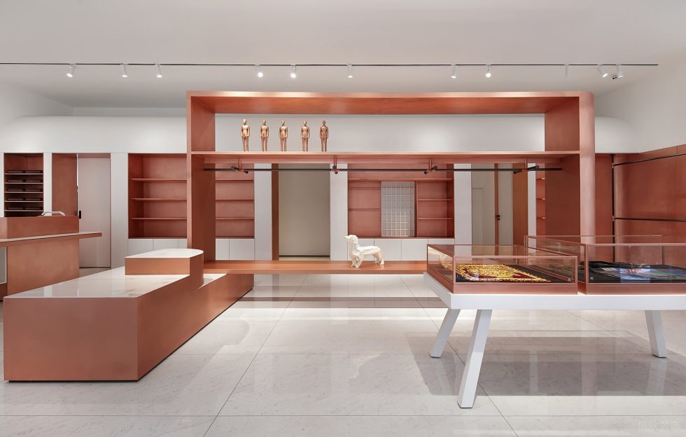 深圳市寶安區(qū)西鄉(xiāng)現(xiàn)代風(fēng)品牌胤一紅幫服裝店中島展柜裝修設(shè)計(jì)效果圖